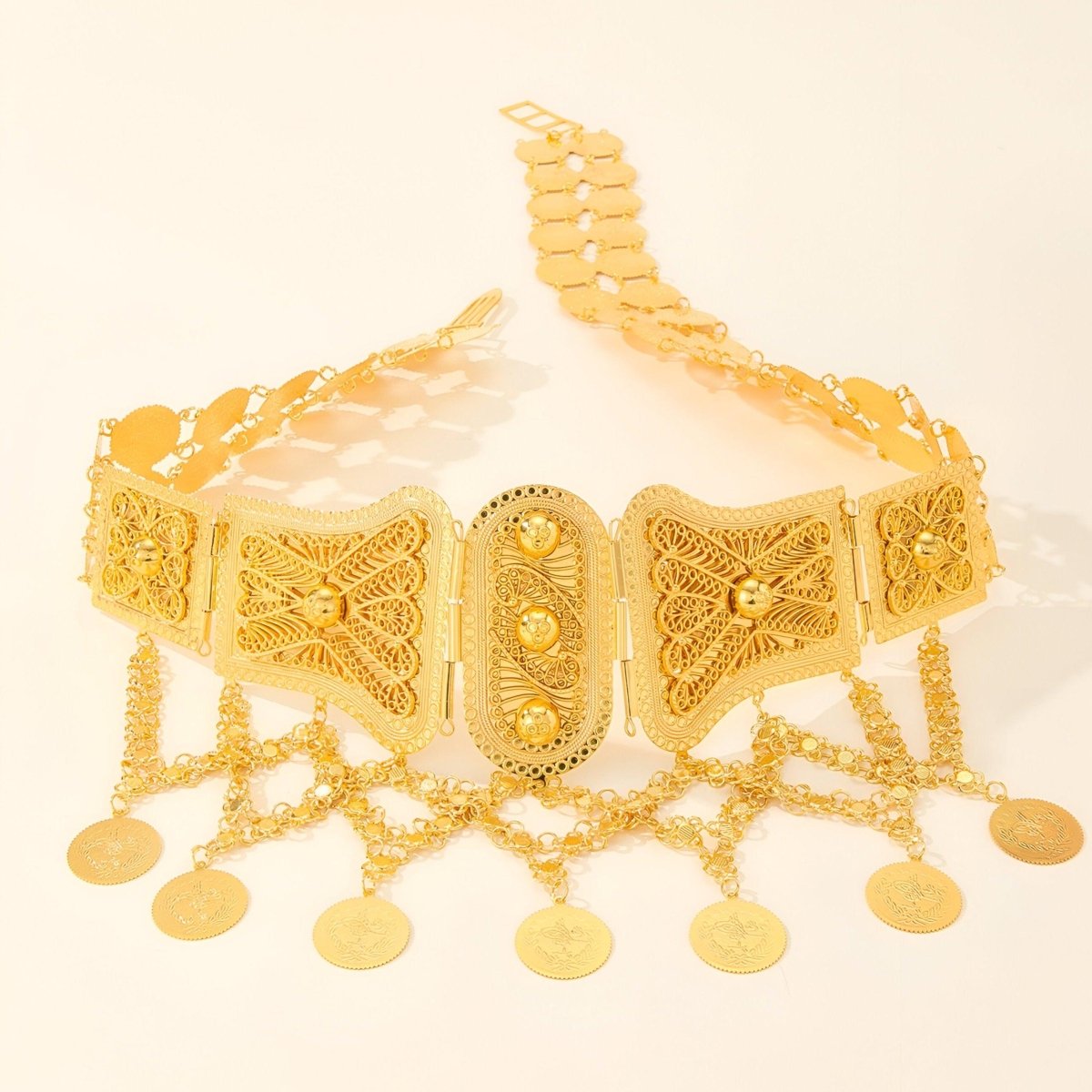 Ceinture marocaine dorée avec pendentifs qui s'entrelacent, modèle Menena - La Boutique de la Ceinture